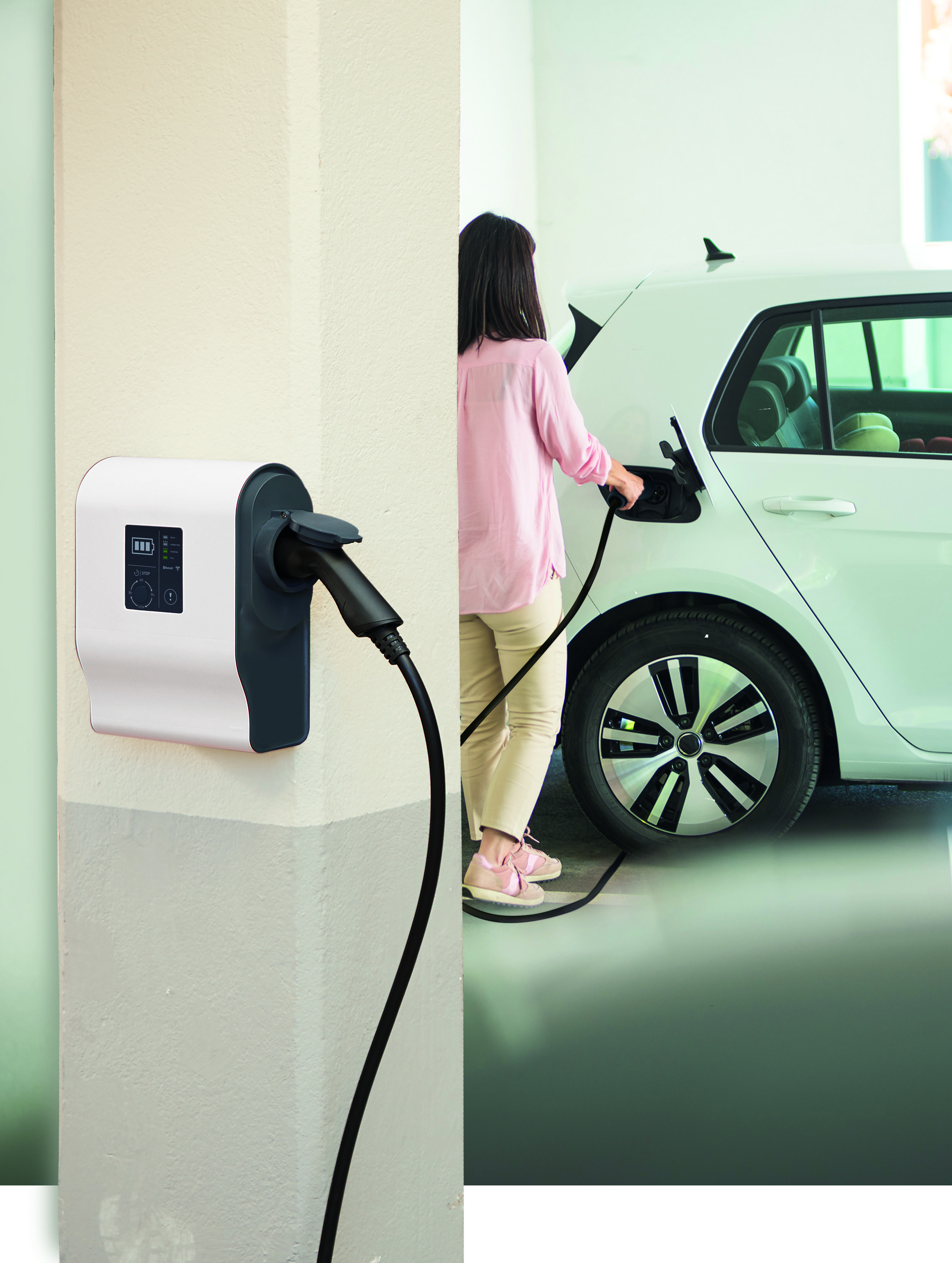 Woman with Ev Charger